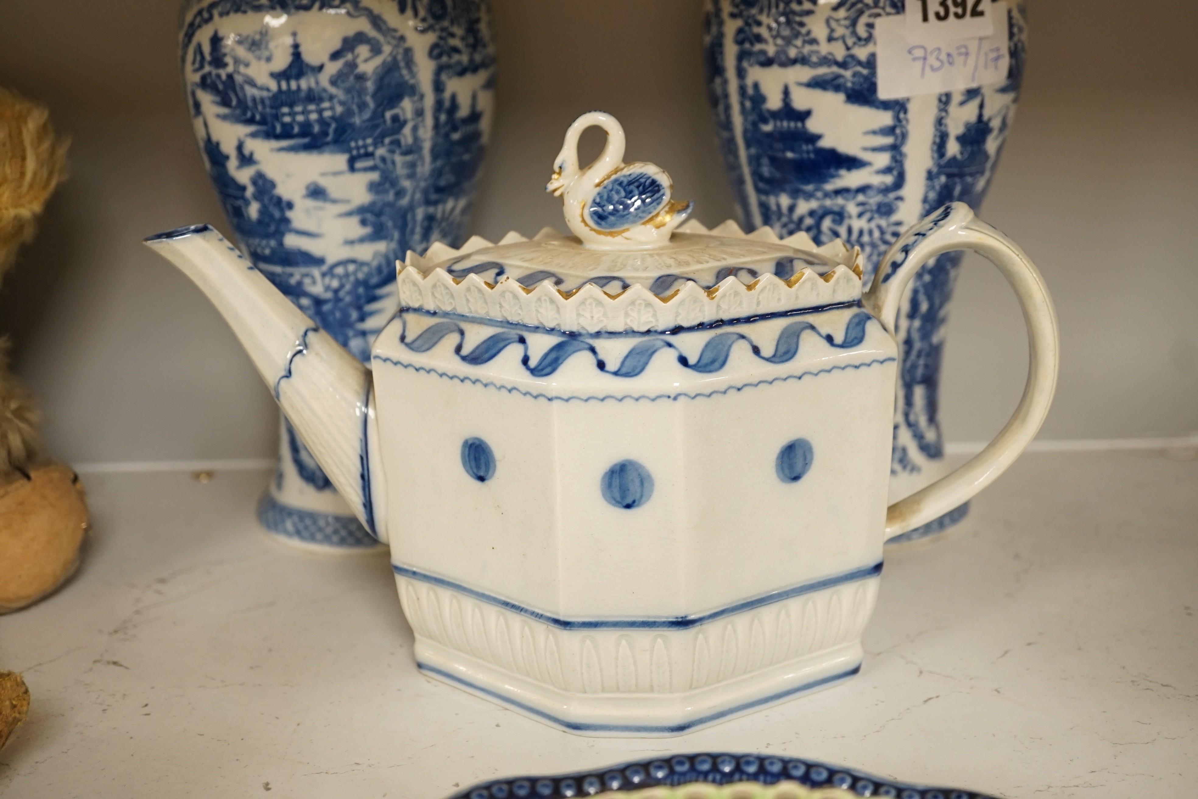 A pair of 19th century blue and white chinoiserie vases, a pearlware teapot, possibly Harley of Lane End, c.1805, three cream ware plates and two other plates, tallest 25cm